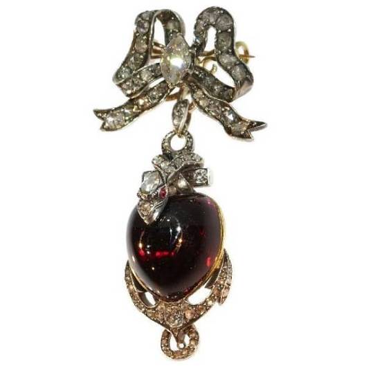 Unique-pendentif-broche-ruban-serpent-et-ancre-du-19ème-siècle-en-or-rose-18-carats-et-argent-serti-d'un-grenat-en-cabochon-et-diamants